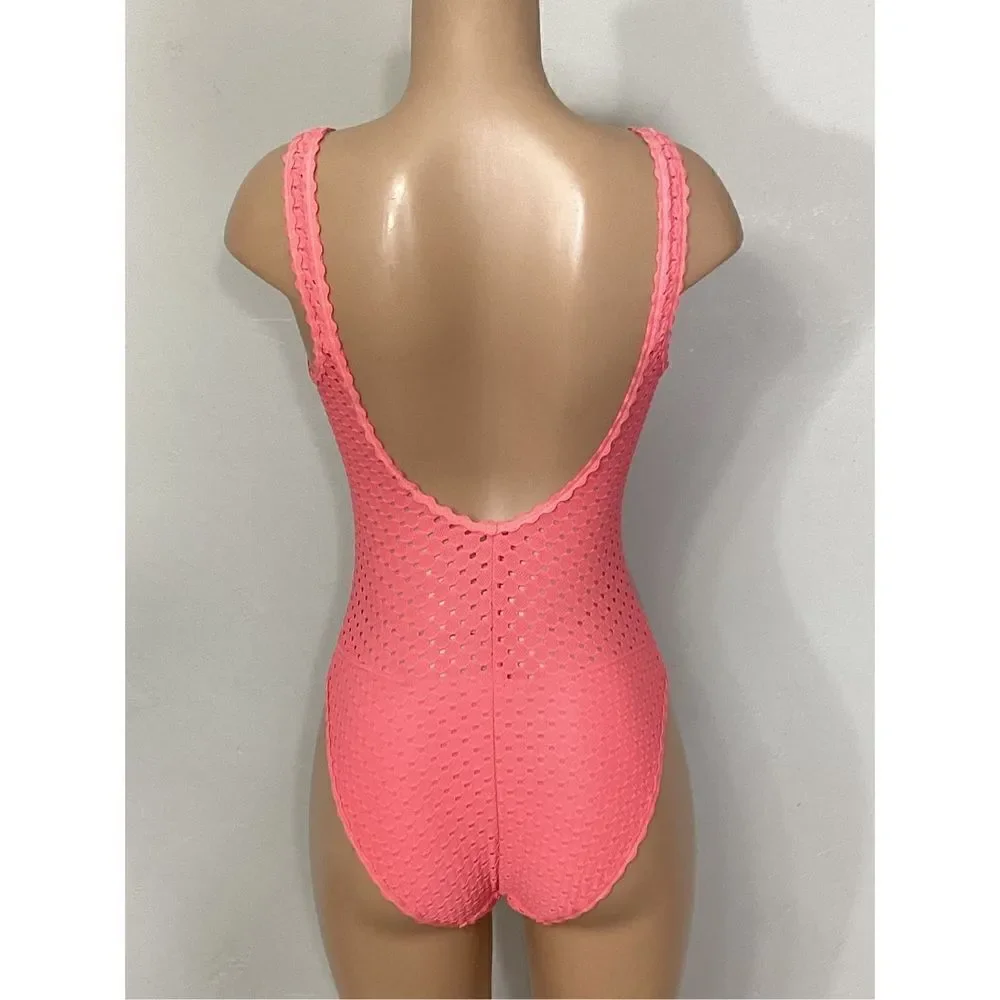New. Robin Piccone coral crochet lace swimsuit. Retails $178. Small